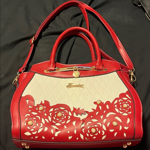 Red and White Handbag with Floral Cutouts - Picture 1 of 4